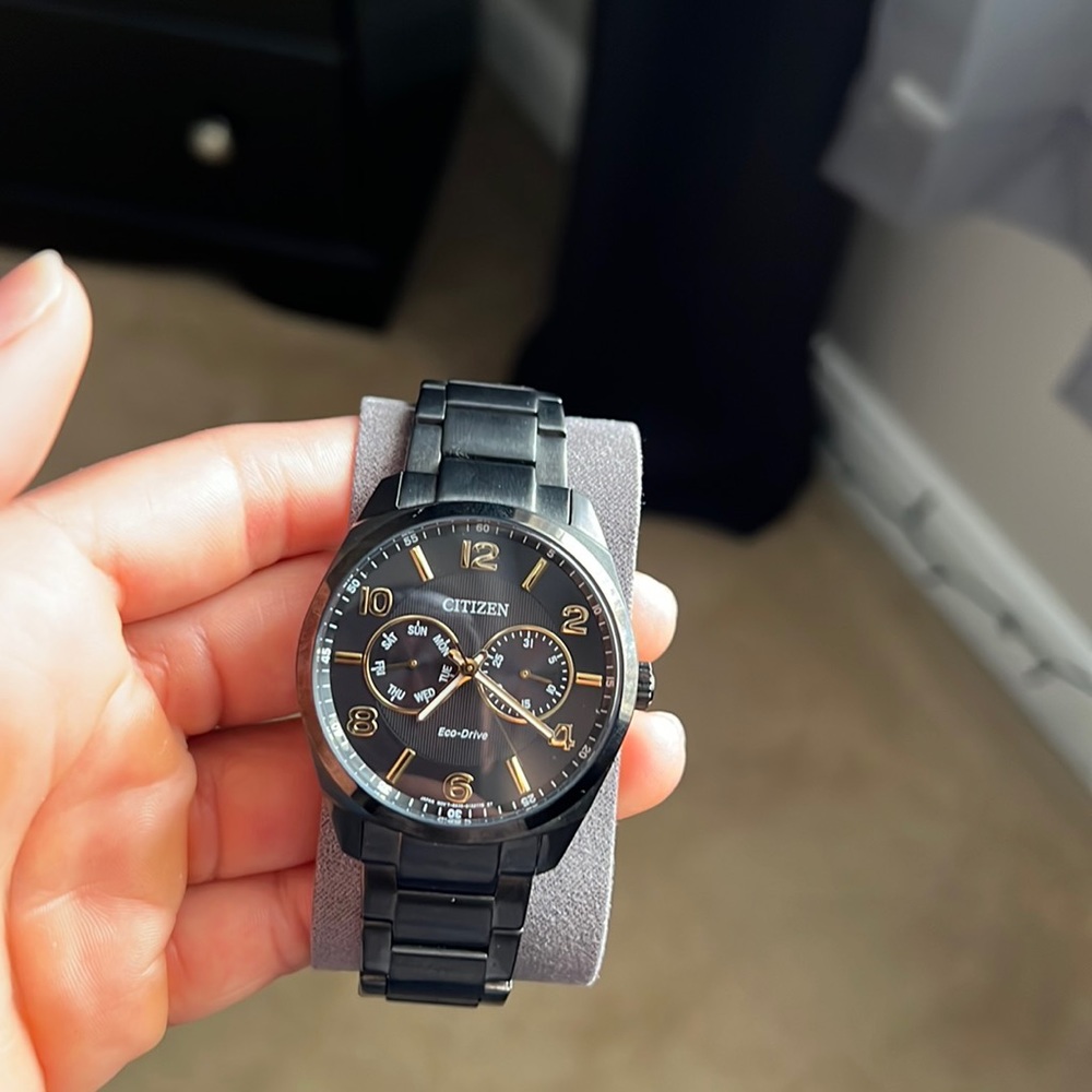 Citizen eco drive black and gold watch